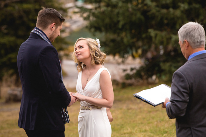 bride looking up at groom during elopement ceremony