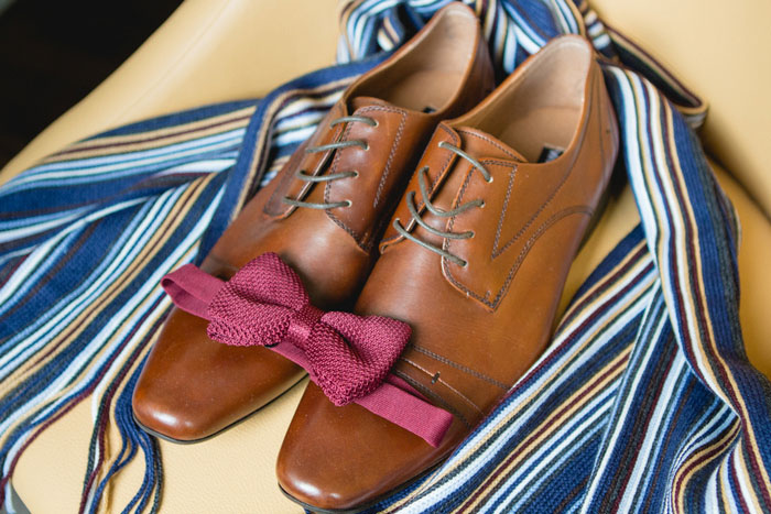 groom's shoes and bow tie
