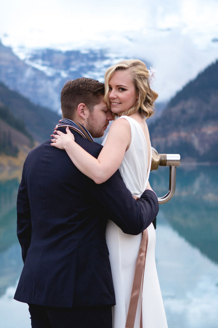 bride and groom portrait at Lake Louise
