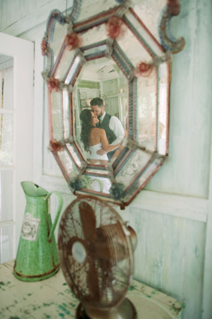 bride and groom refelction in mirror