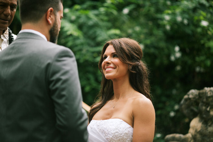 bride looking at groom during ceremony