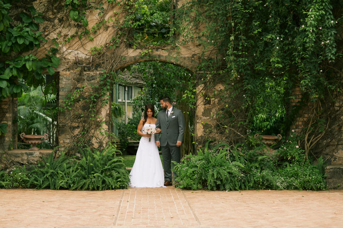 bride and groom entering Haiku Mills