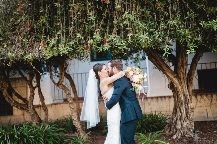 bride and groom kissing