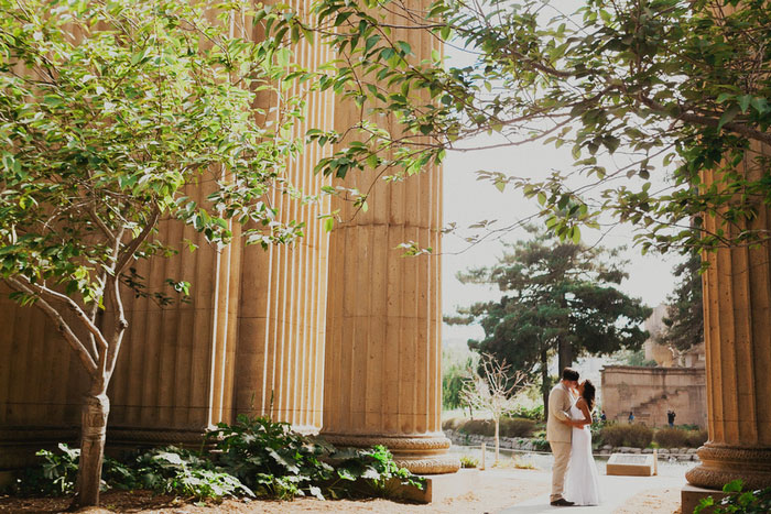 portrait of bride and groom kissing