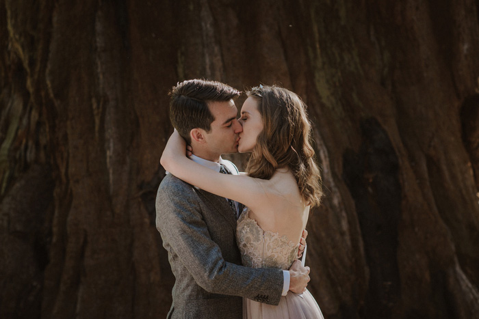 bride and groom first kiss