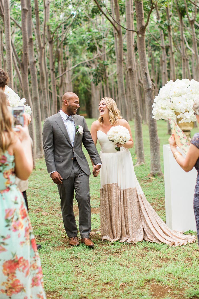 bride and groom walking down aisle