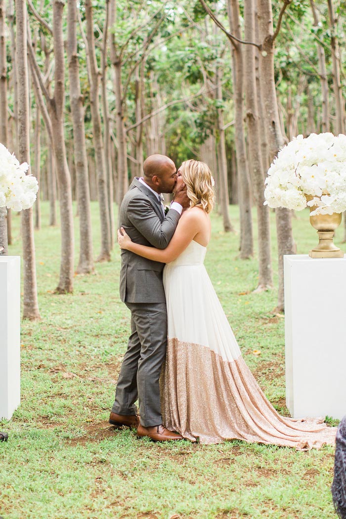 bride and groom first kiss