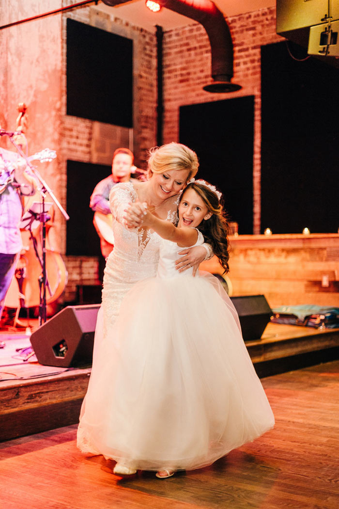 bride dancing with daughter