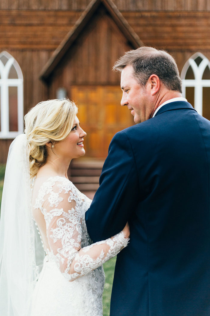 bride and groom portrait outside church