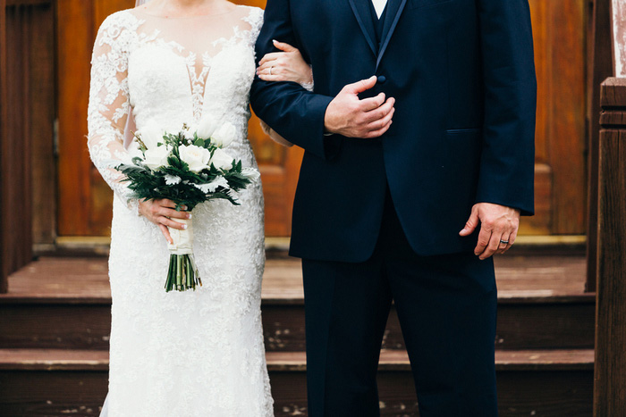 bride and groom portrait outside church