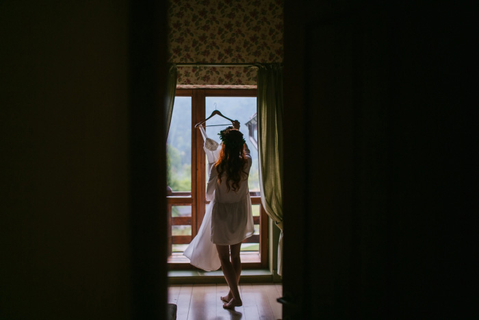 bride walking with wedding dress