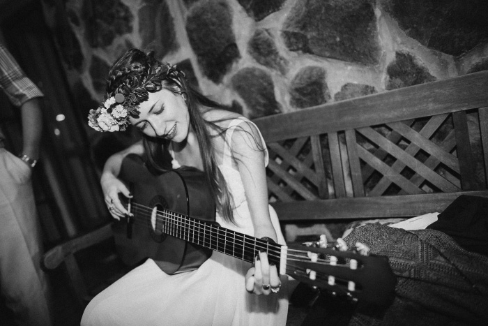 bride playing guitar