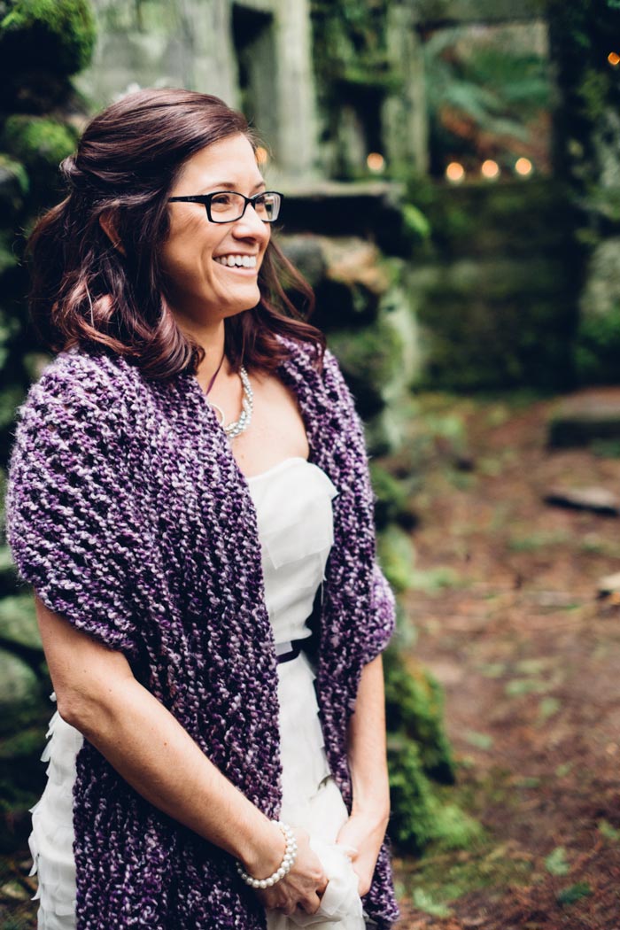 bride wearing purple knit shawl