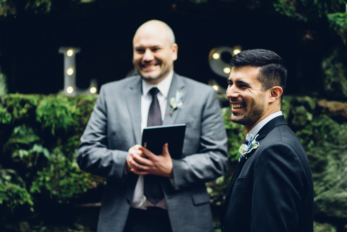 groom waiting for bride at altar