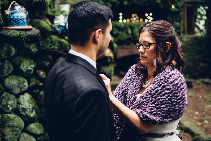 bride adjusting groom's tie