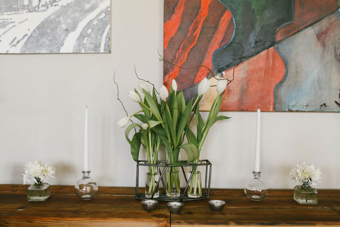 white tulips on sideboard