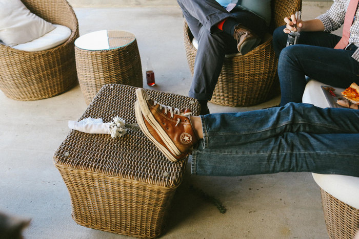 wedding guest putting feet up