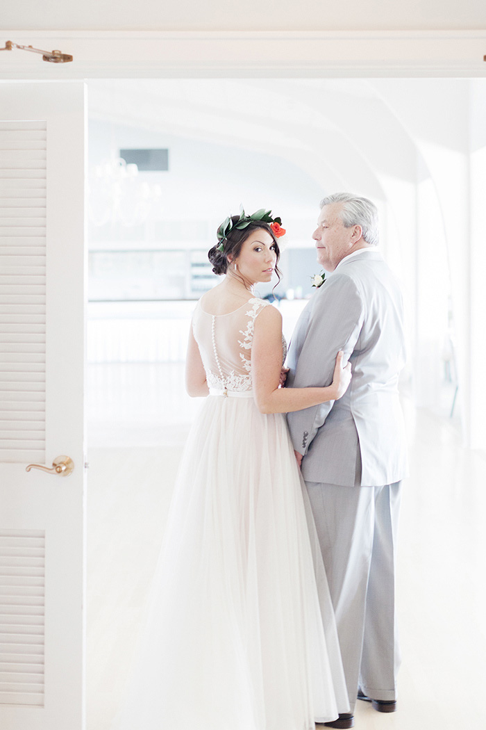 bride waiting with father