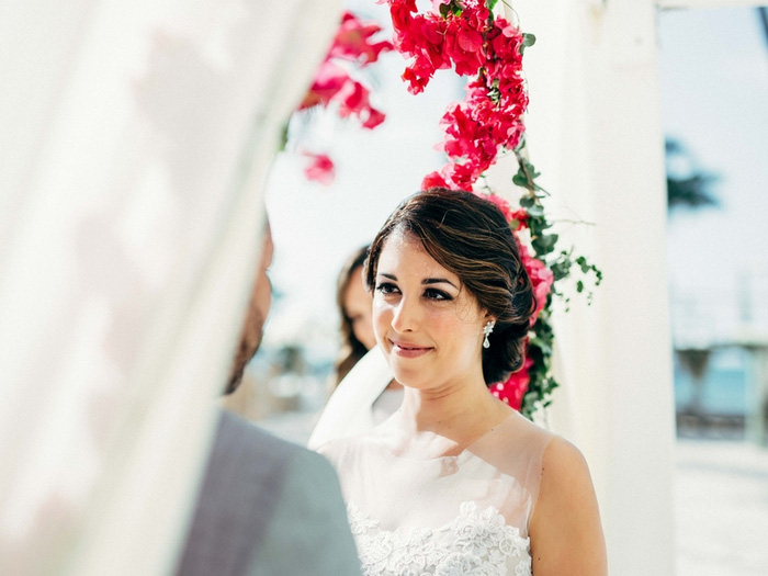 bride looking at groom during ceremony