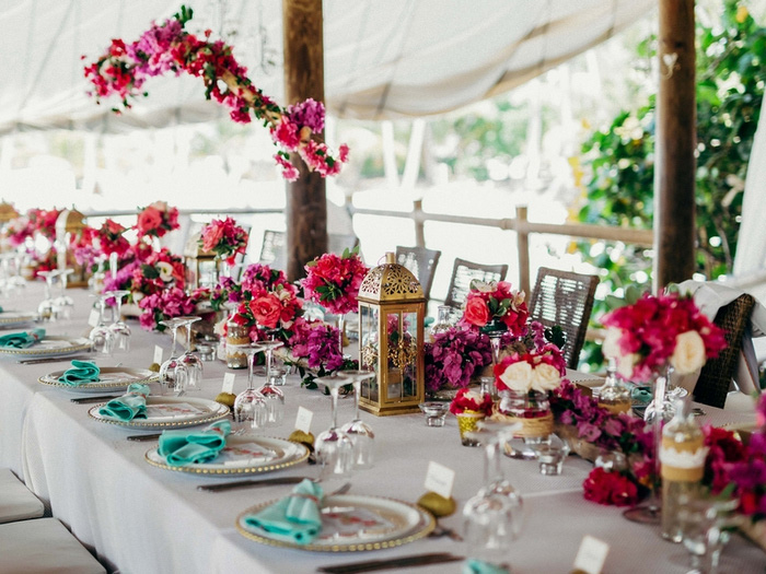 wedding table setting with pink flowers