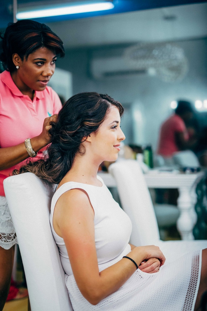 bride getting hair done