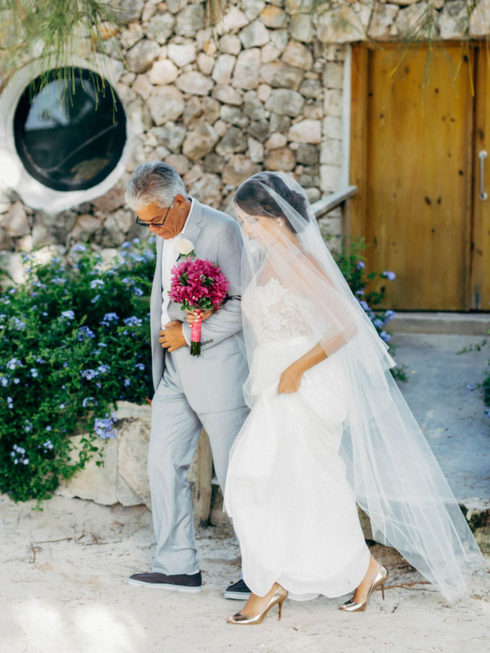 bride being escorted by father