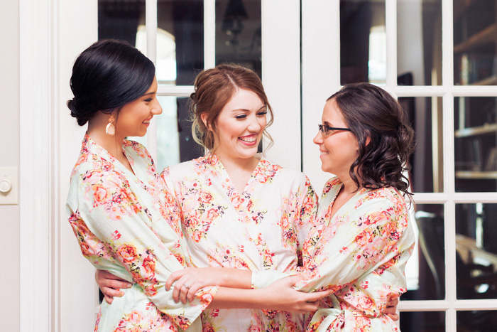 bride and bridesmaids in floral robes