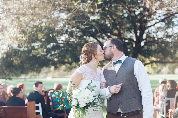 bride and groom kissing