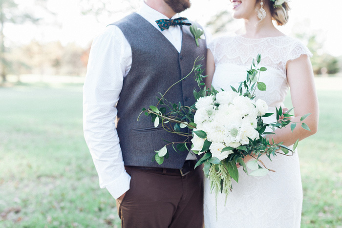 bride and groom portrait with bouquet