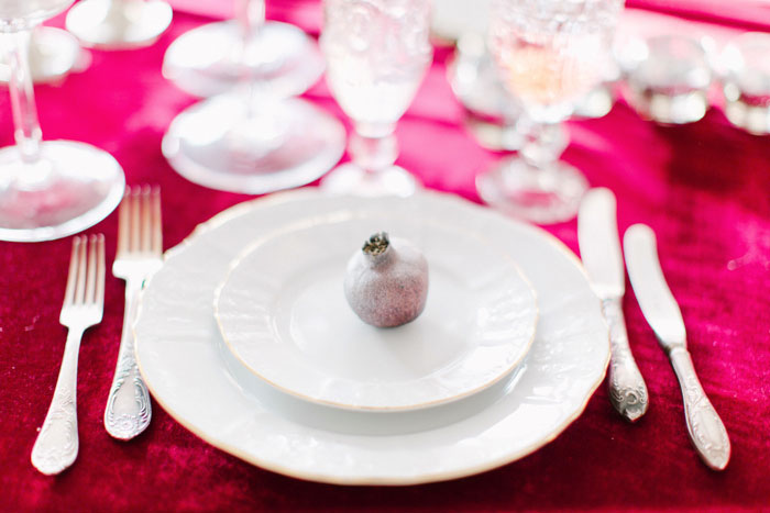 silver pomegranate on plate