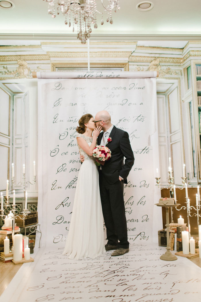 bride and groom first kiss