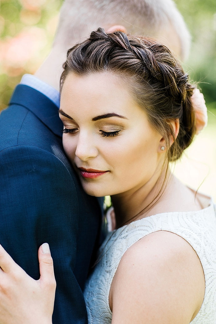 bride embracing groom