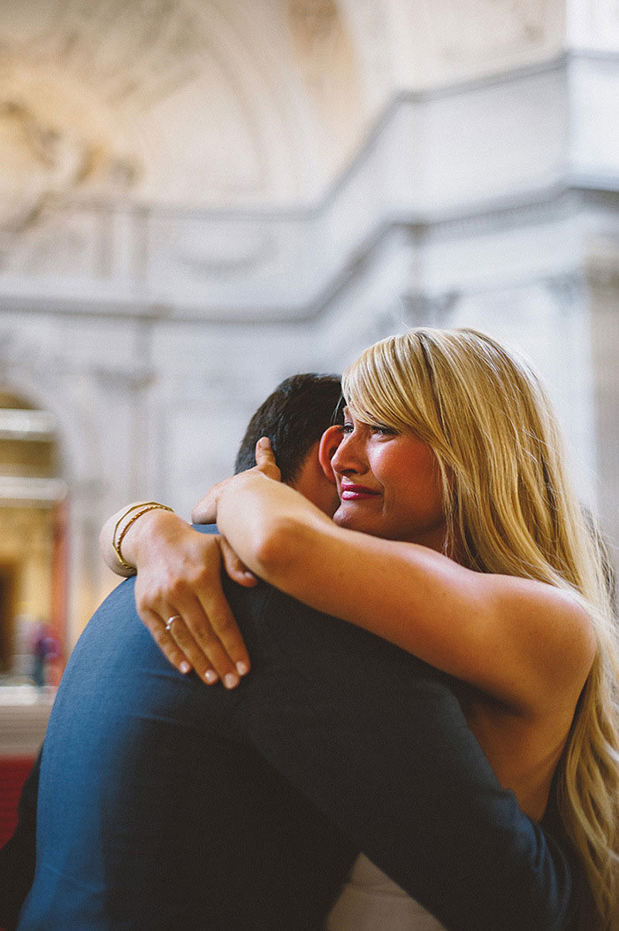 bride and groom hugging at end of ceremony