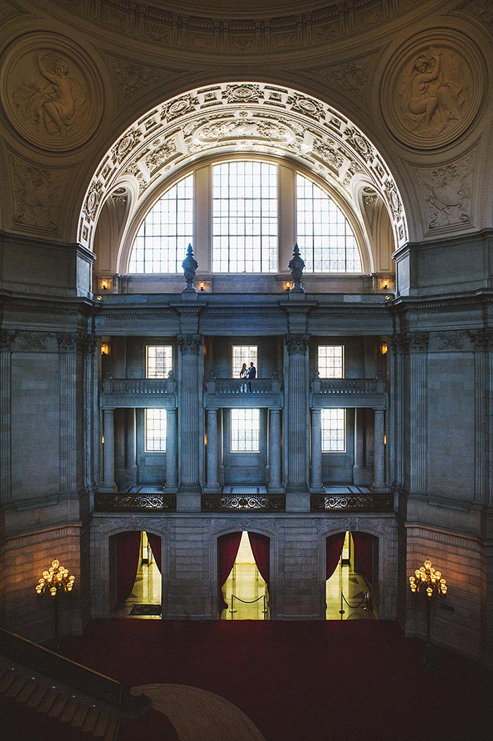 bride and groom portrait in San Francisco city hall