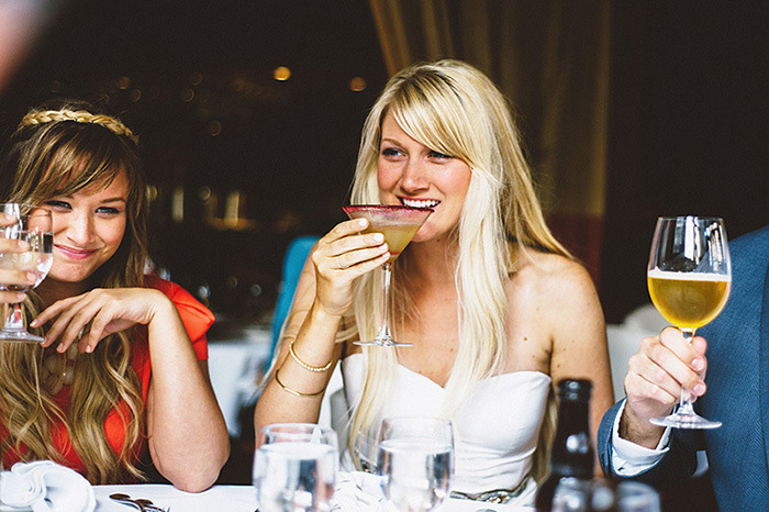 bride sipping a cocktail