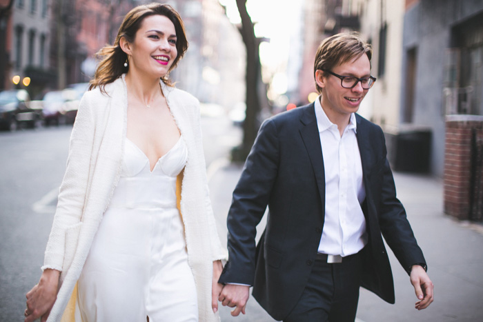 bride and groom walking down the street