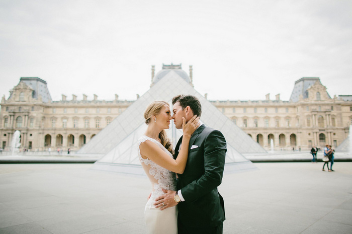 bride and groom portrait in front of Louvre