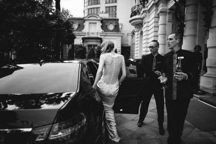 bride getting into car