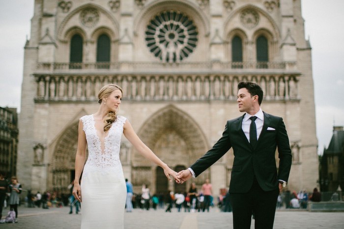 bride and groom portrait in front of Notre Dame