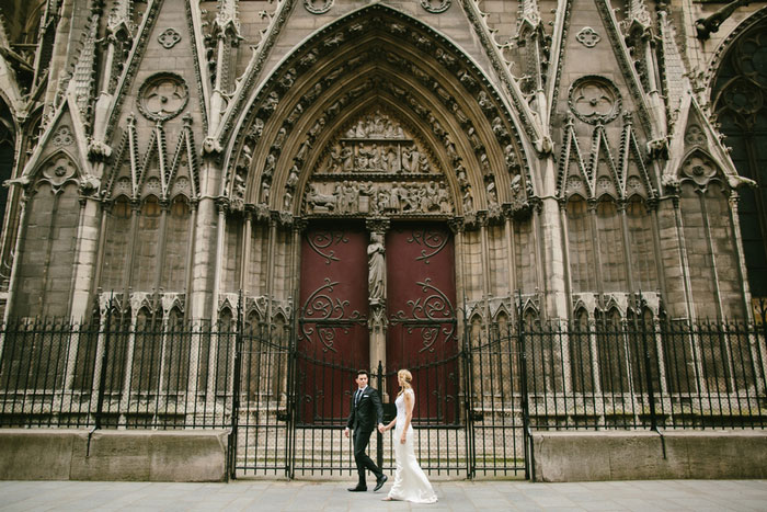 bride and groom portrait in front of Notre Dame