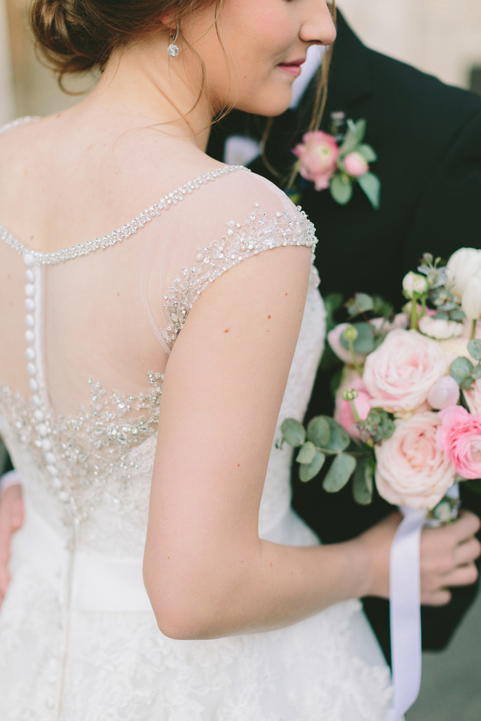 detail of back of bride's dress