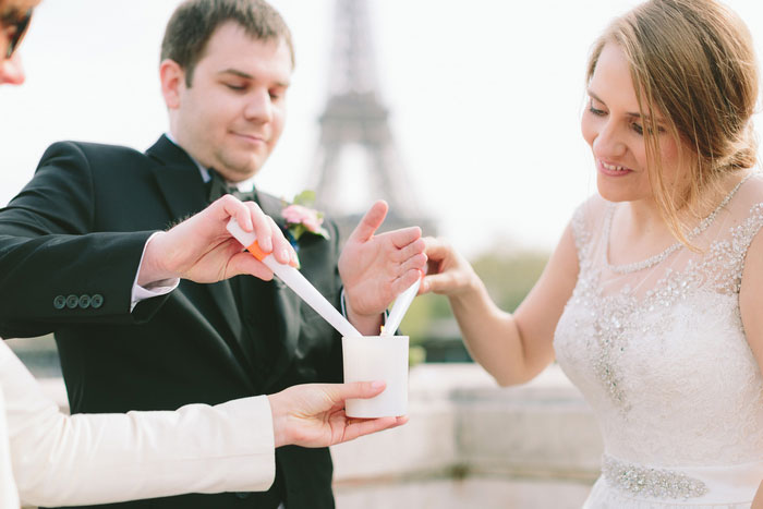 bride and groom performing candle ceremony