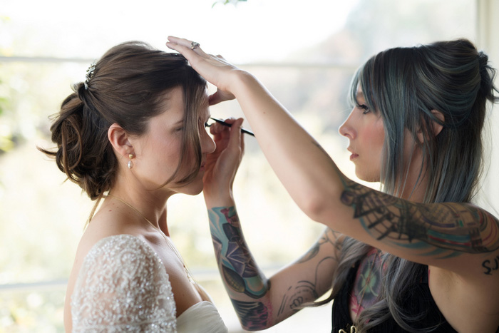 bride's make-up being applied