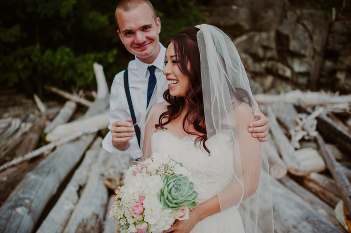 bride and groom laughing