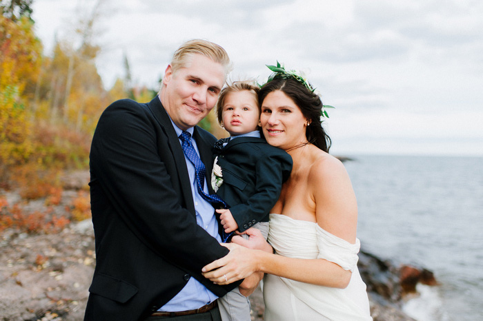 bride and groom portrait with son