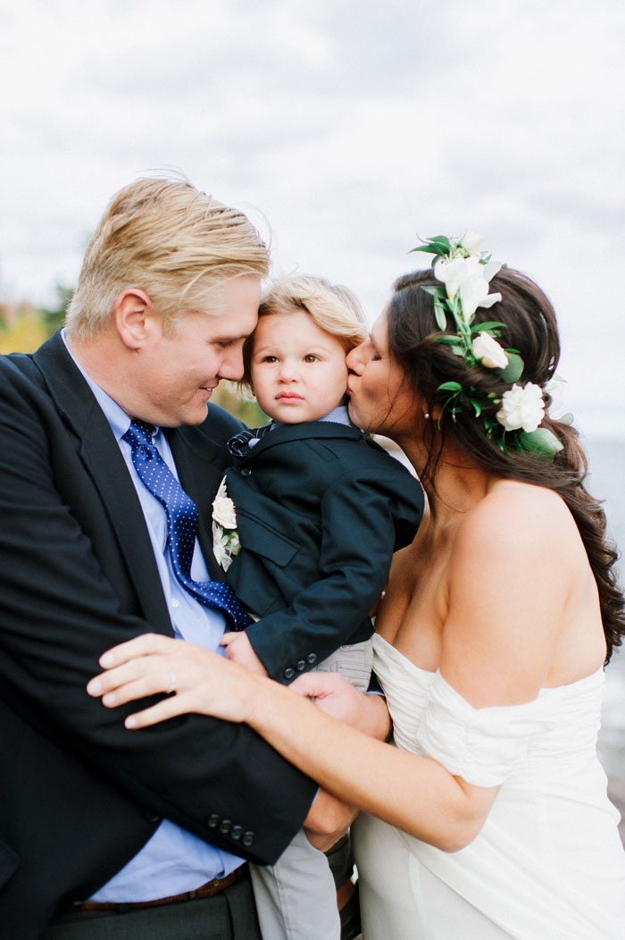 bride and groom with son