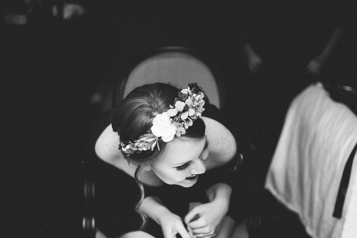 bride laughing in make-up chair