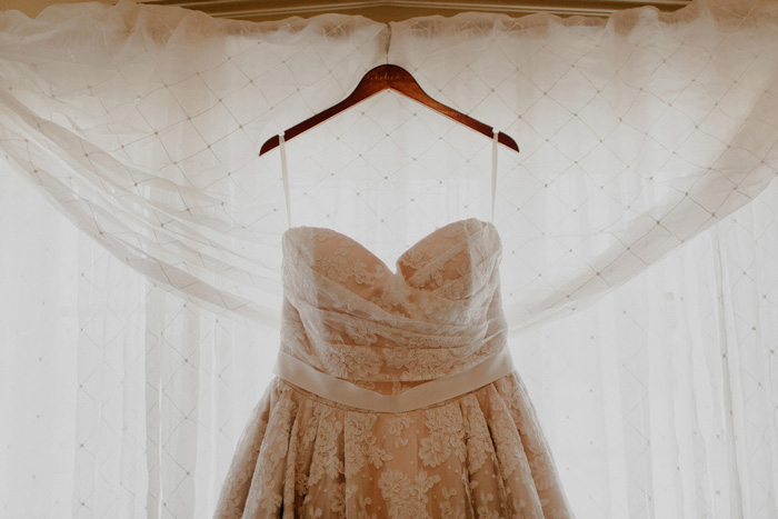 wedding dress hanging up