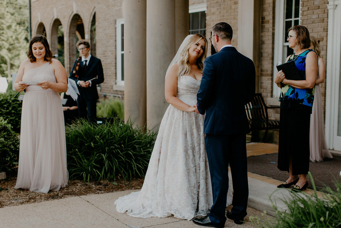 bride looking up at groom during wedding ceremony