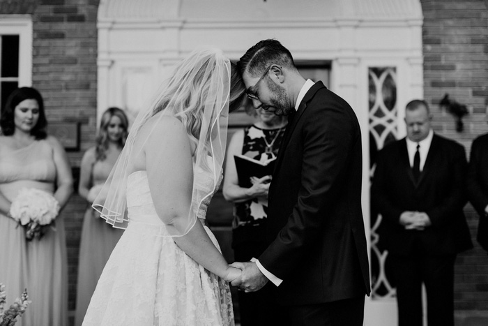 bride and groom tete-a-tete during ceremony